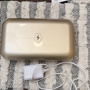 Phone soap.  Gold Phone Sanitizer with Charger